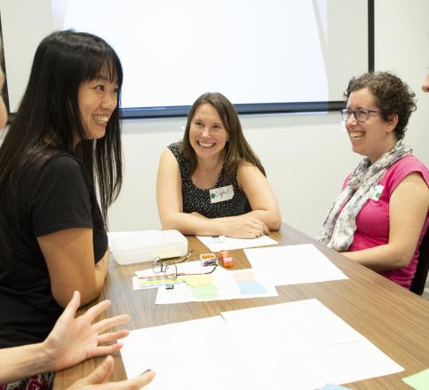 Teachers talking around the table