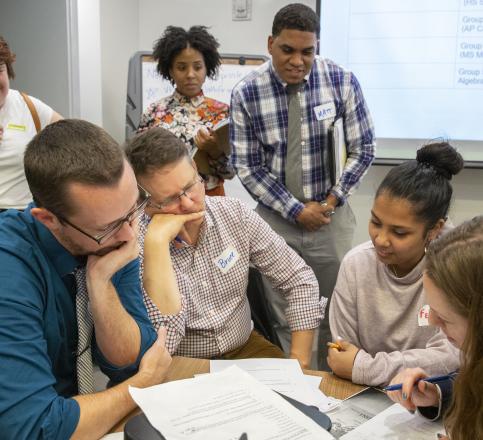 Teachers working around the table