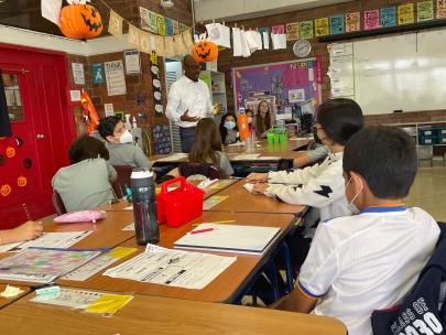 Seyi with students